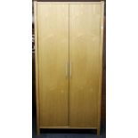 A contemporary two door pine wardrobe, W. 93cm. H. 189cm.