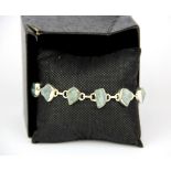 A 925 silver and aquamarine bracelet.