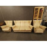 A stylish 1970's three piece suite frame, settee W. 184cm. For re-upholstery only.