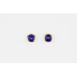 A pair of 9ct yellow gold lapis lazuli set stud earrings, Dia. 0.6cm.