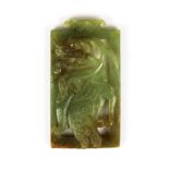 A Chinese carved celadon jade panel of a crane, 8.5 x 4.8cm.