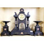 A large 19th Century French slate and marble mantle clock with garnitures, H. 48cm. (no pendulum