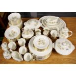 A very extensive Royal Doulton 'Yorkshire Rose' tea and dinner set, 12 settings.
