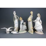 A group of five Lladro porcelain figurines, some A/F. Tallest 28cm.