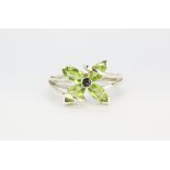 A 925 silver ring set with marquise cut peridots, (R).