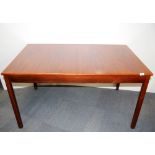 A 1960's extending hardwood dining table, 83 x 135cm. extending to 180cm. Purchased c. 1969.