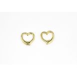 A pair of 9ct yellow gold (stamped 375) heart shaped stud earrings, L. 1.1cm.
