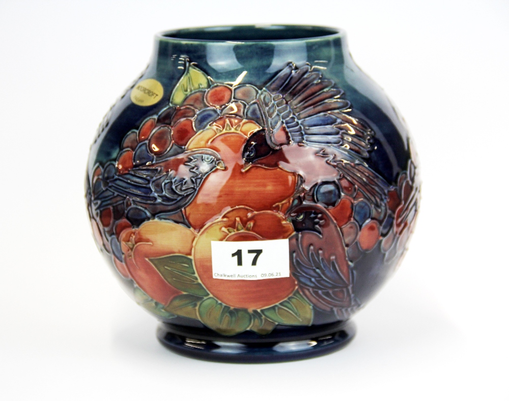 A Moorcroft tube -lined bird and pomegranate pattern vase, H. 17cm. Dia. 18cm.