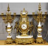 An impressive French porcelain, gilt bronze and brass three piece clock garniture, H. 68cm.
