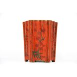 A Chinese lacquered sectional wooden brush pot, H. 13.5cm.