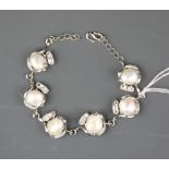 A lovely white metal and baroque pearl bracelet.