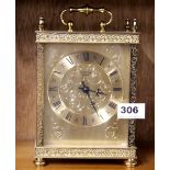 A vintage brass Estyma carriage style mantle clock with quartz movement, H. 22cm. Understood to be