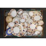 A box of mixed vintage china.