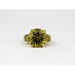 A 925 silver gilt citrine and white stone ring (O).