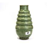 An interesting Chinese celadon glazed porcelain vase of a basket design above a lotus base, H.