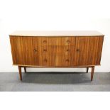 A 1960's light mahogany sideboard with Frederick Restall label, W. 152cm. H. 86cm.