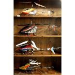 Four model helicopters for radio control (no handsets), L. 64cm.