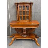 An unusual mahogany side table cabinet, W. 109cm. H. 155cm. Condition: one back leg currently