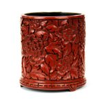 A Chinese cinnabar lacquer brush pot, H. 14cm. Dia. 14cm.