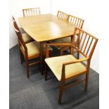A 1960's light mahogany extending dining table and six chairs, table size 140 x 91cm.