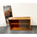 A 1970's teak wall cabinet, W. 80cm. together with a 1970's teak wall mirror, H. 95cm.