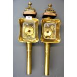 A pair or 19th Century brass and copper coach lamps by the Limehouse Lamp Company, H. 52cm.