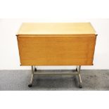 A 1970's teak bar trolley with drop front, 81 x 37 x 70cm.