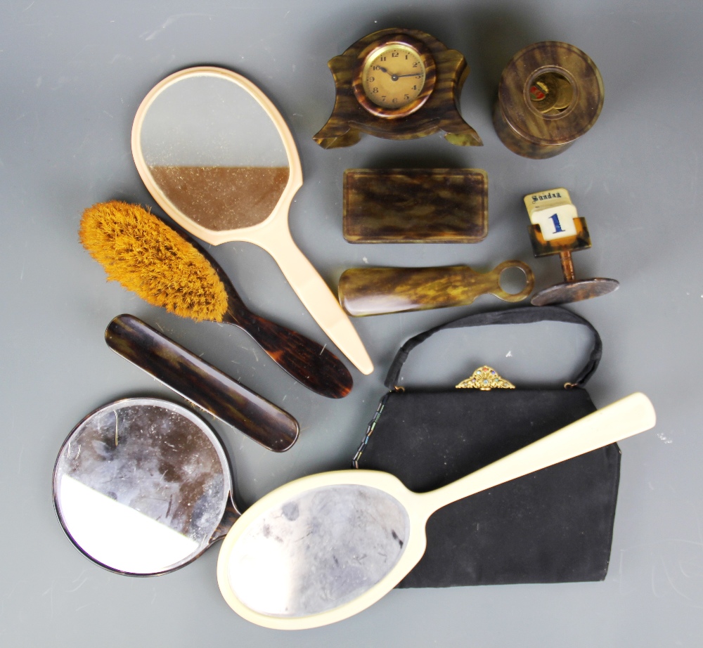 A quantity of 1920's tortoise shell and other dressing table items.