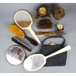 A quantity of 1920's tortoise shell and other dressing table items.