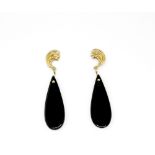 A pair of yellow metal (tested 9ct gold) drop earrings set with onyx, L. 3.2cm.