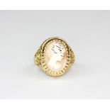 A 9ct yellow gold cameo set ring, approx. 5.9gr, (N).