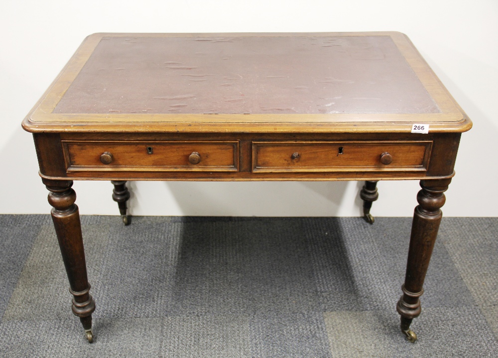 A Victorian two drawer mahogany desk, W. 104 x 69 x 73cm.