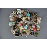 A box of approximately 60 vintage dress rings.