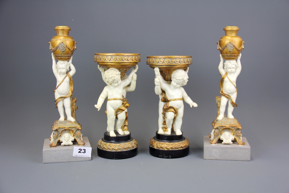Two pairs of resin composition cherub candlesticks, tallest 29cm.