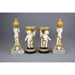 Two pairs of resin composition cherub candlesticks, tallest 29cm.