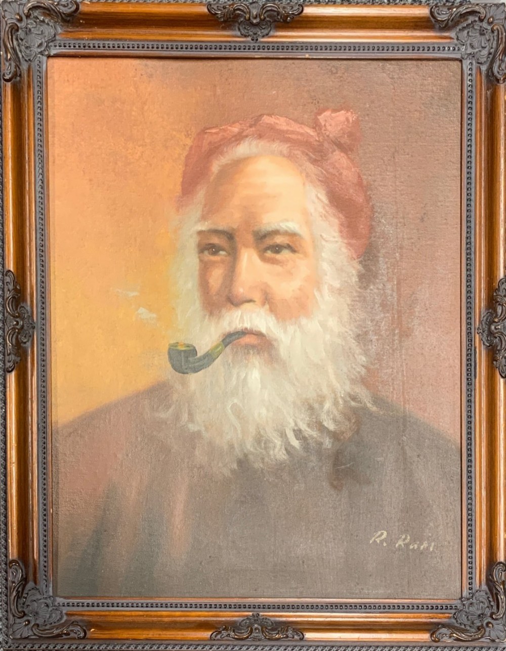 A framed oil on board of an Eastern gentleman smoking a pipe signed R. Rafi, frame size 49 x 60cm.