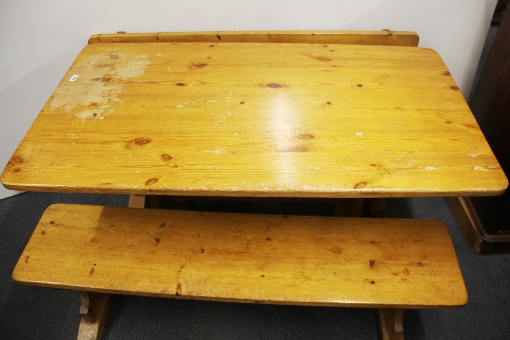 A vintage pine kitchen table and two benches, L. 137cm. W. 76cm. - Image 2 of 2