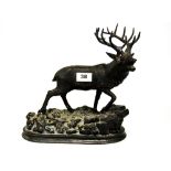 A cast bronze figure of a baying stag, H. 28cm.