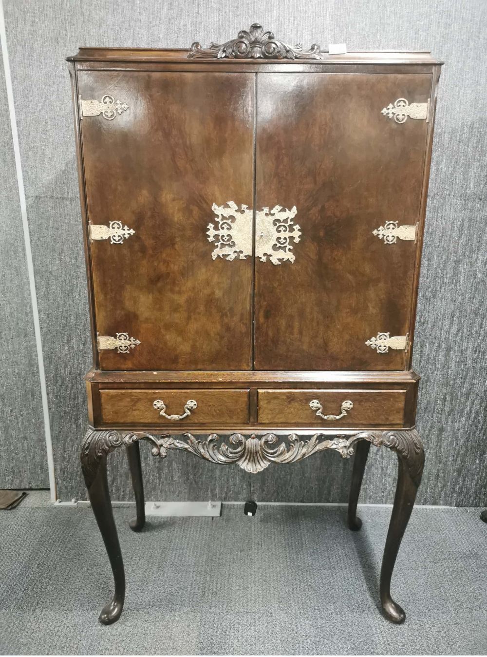 A 1950's beechwood drinks cabinet, W. 92cm. H. 159cm. A/F to top.