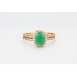 A 925 silver rose gold gilt emerald and white stone set cluster ring, (S).