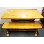 A vintage pine kitchen table and two benches, L. 137cm. W. 76cm.