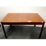 A 1960's extending hardwood dining table, 83 x 135cm. extending to 180cm. Purchased c. 1969.