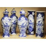 A garniture of three 19th century Chinese blue and white porcelain jars and lids together with a