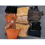A group of ladies vintage leather bags.