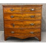 A Georgian mahogany veneered bow front chest of drawers, W. 105cm H. 101cm.