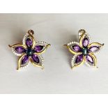 A pair of 925 silver gilt flower shaped earrings set with marquise cut amethysts and cabochon cut