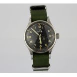 An Omega Type 53 6B/542 RAF Pilot's wrist watch. Rare original "Thin Arrow" dial c.1953.