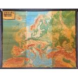 A large wall mounted plasticised canvas relief map of Europe, W. 215cm.
