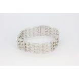 An 18ct white gold (stamped 750) bracelet set with brilliant cut diamonds, approx. 7.35ct diamonds