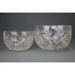 A large cut crystal bowl, Dia. 30cm, H. 19cm, together with a smaller matching bowl.